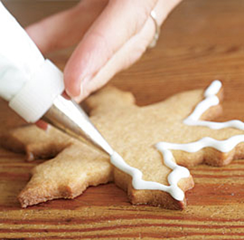 [Photo of decorating a cookie]