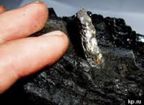 [Photo of a diamond created from coal]
