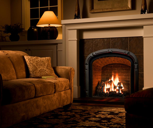 [Photo of a living room with a fire in the fireplace]