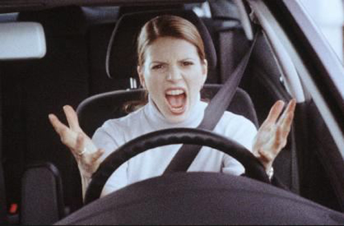 [Photo of an angry woman driver]