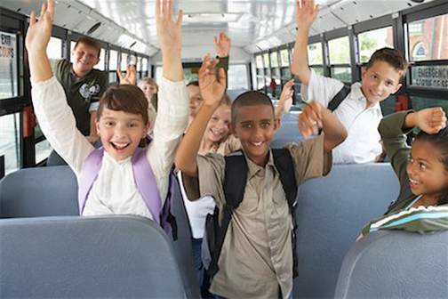 Photo of children on a school bus