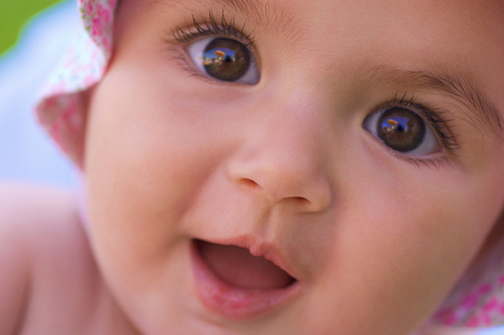 Closeup photo of the face of a baby girl
