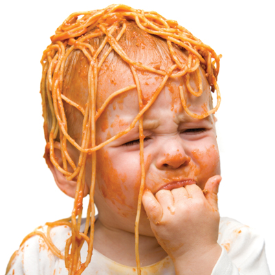 [Photo of a small child covered in spaghetti]