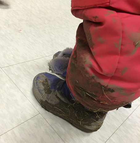 [Photo of muddy boots]